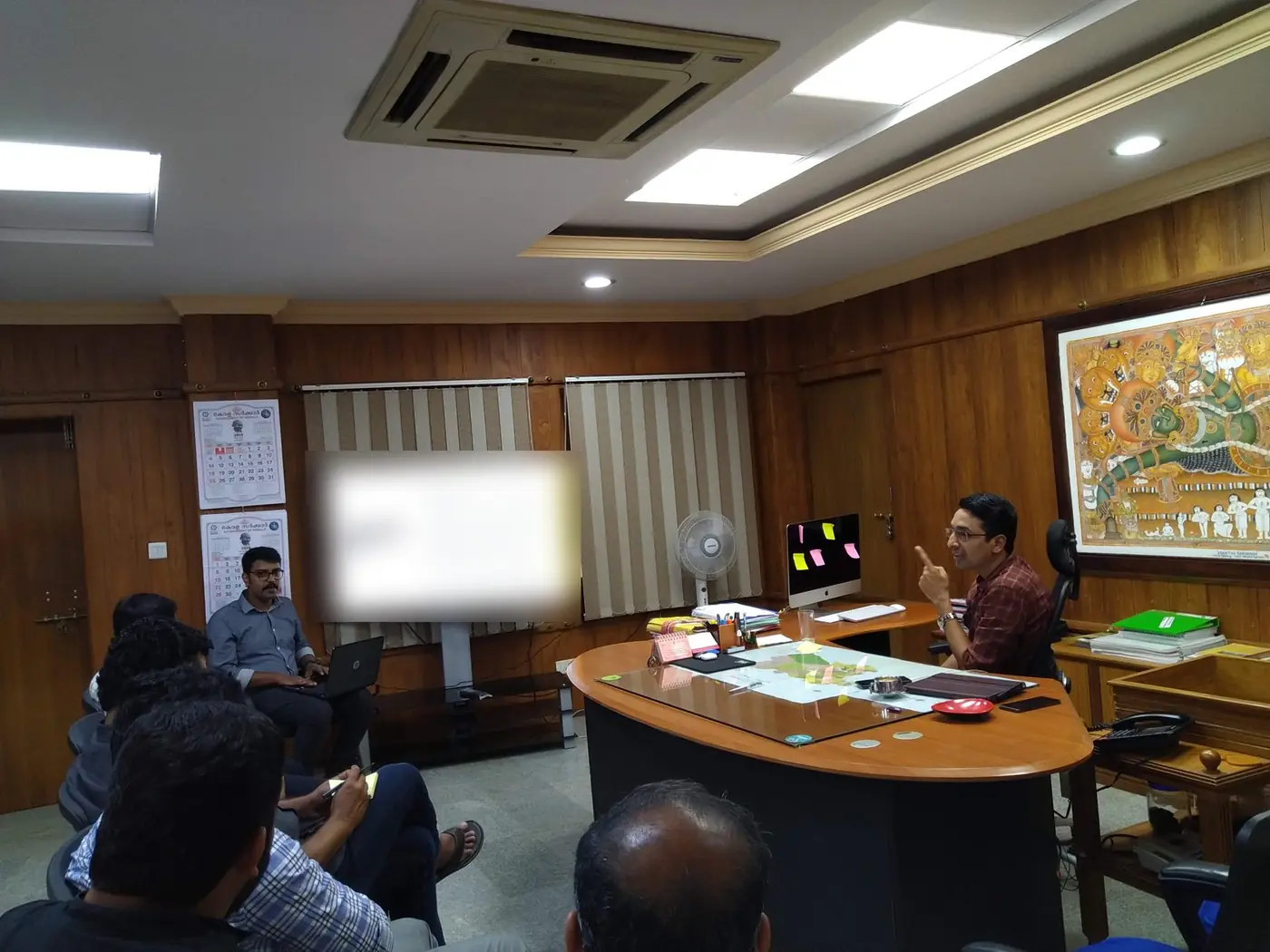 Case review meeting with the District Collector at the Collectorate