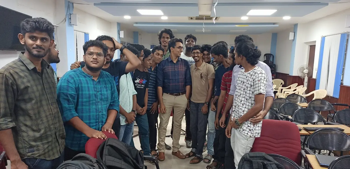College student volunteers with the District Collector