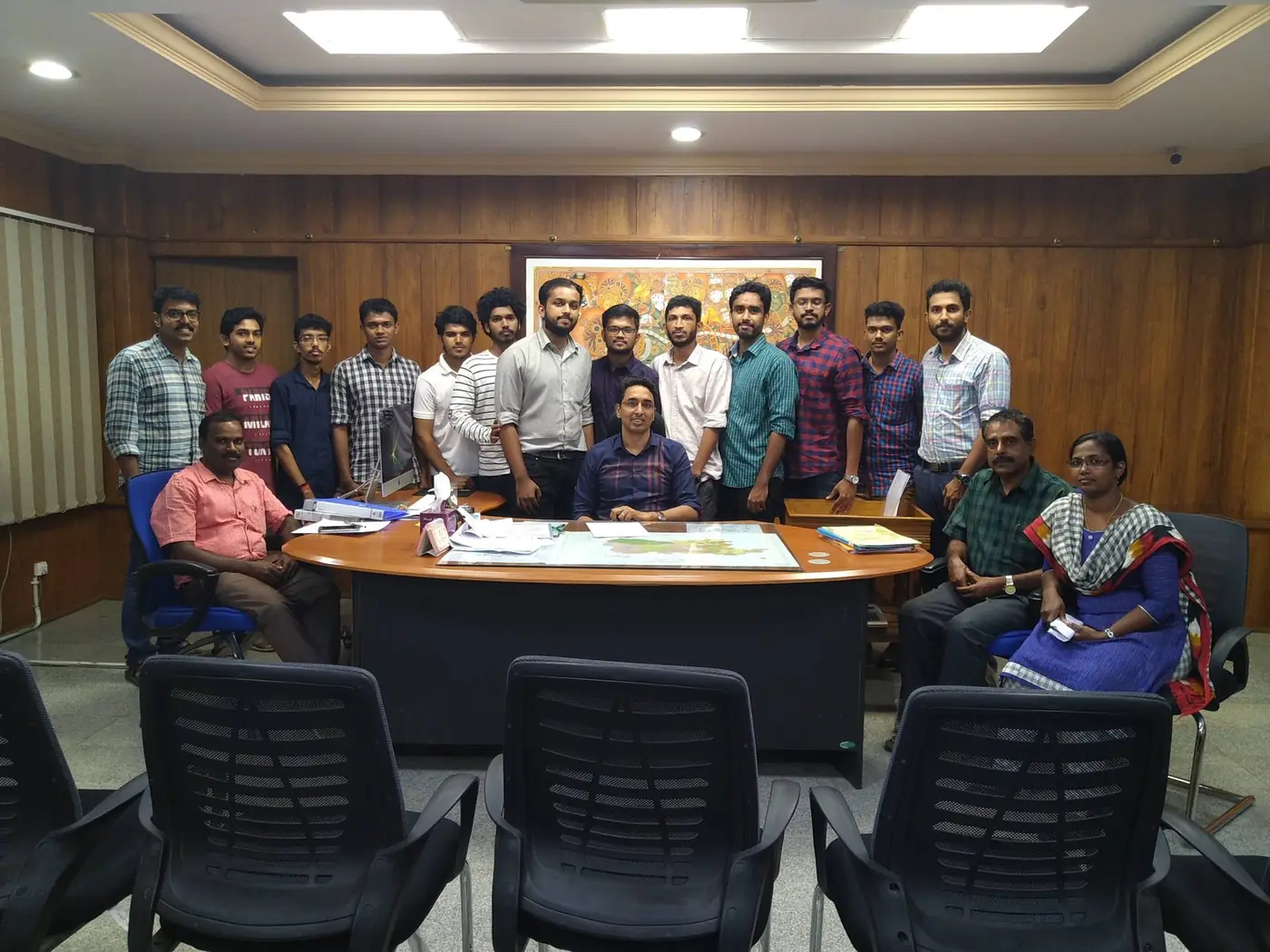 Project Happiness volunteer team with the District Collector at the Collectorate